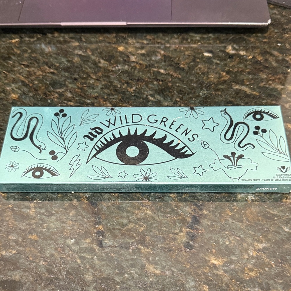 Urban Decay Wild Greens Palette with Black Illustrations